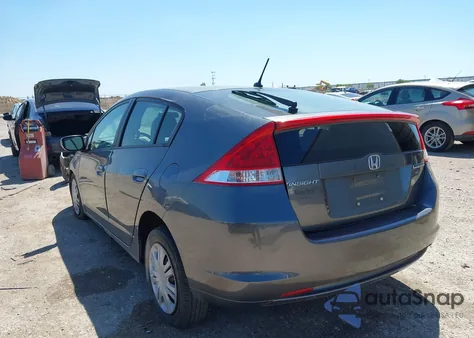2010 Honda Insight Lx z USA, uszkodzony, nr VIN JHMZE2H58AS014625
